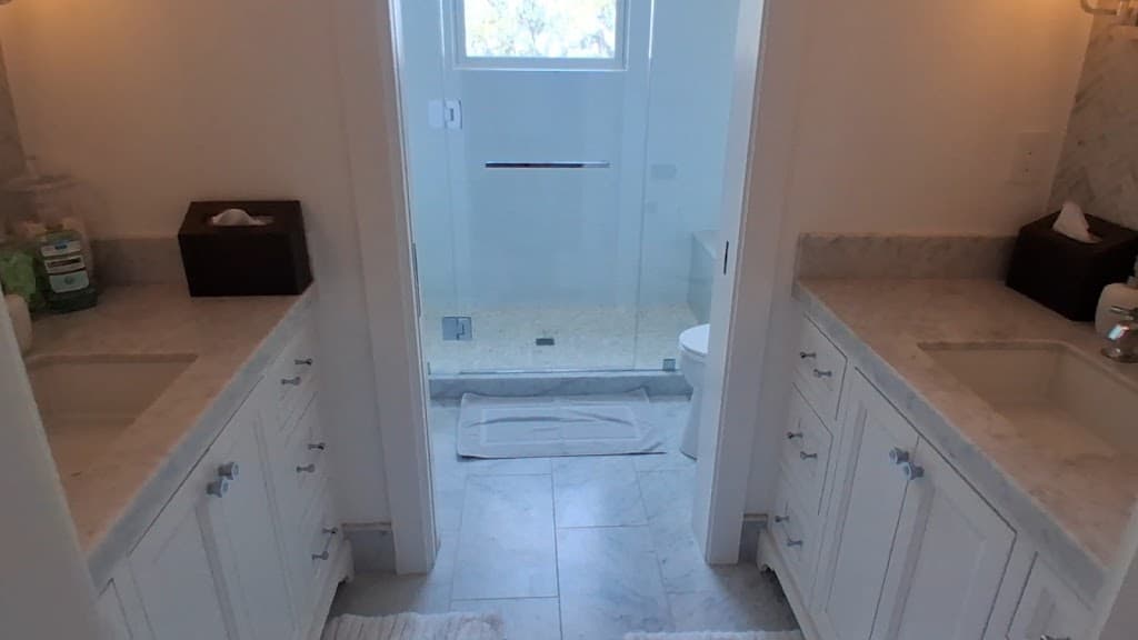 Sparkling clean bathroom with double vanity after a Bright White Cleaning Co deep clean